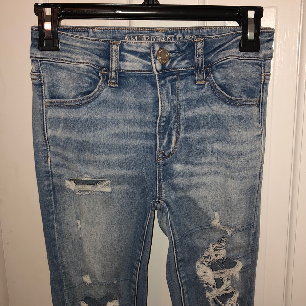 blue ripped jeans